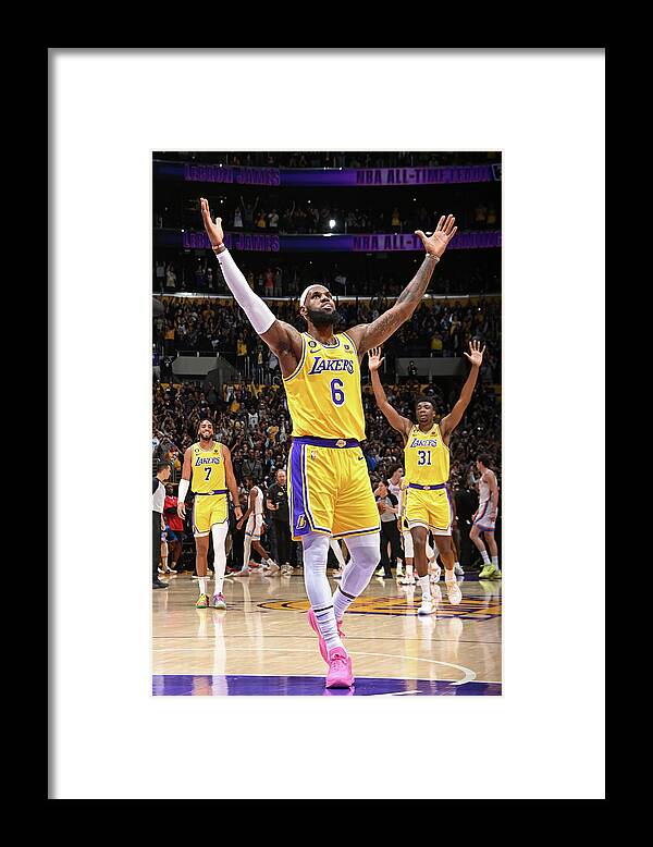 Lebron James Framed Print featuring the photograph LeBron James Celebrates After Breaking the All-Time Scoring Record by Andrew D. Bernstein