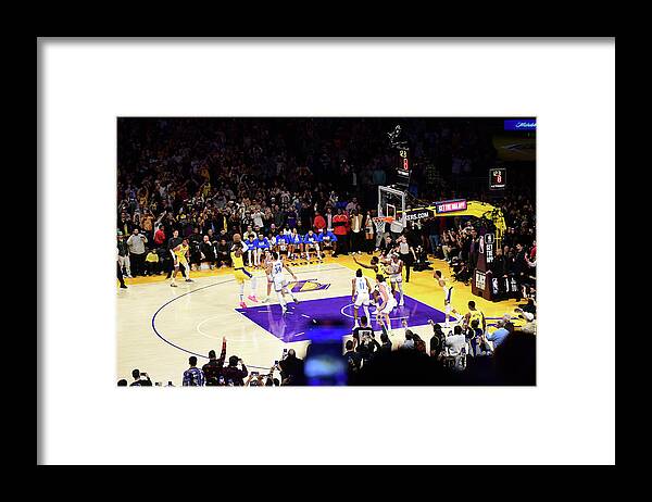 Lebron James Framed Print featuring the photograph LeBron James Shoots the Ball to Break the All-Time Scoring Record by Adam Pantozzi