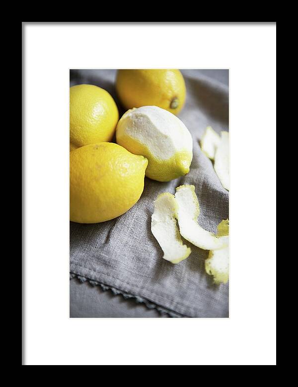 Ip_11169421 Framed Print featuring the photograph Lemons, Whole And Partially Peeled by Studer, Veronika