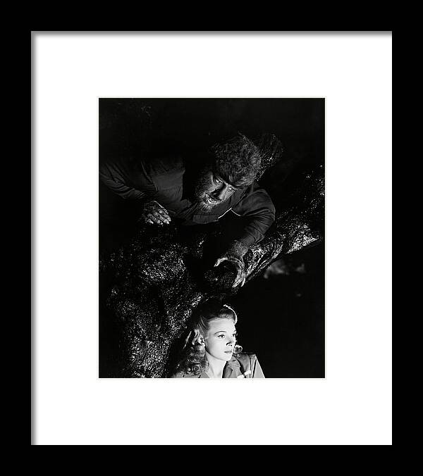 Evelyn Ankers Framed Print featuring the photograph LON CHANEY JR. and EVELYN ANKERS in THE WOLF MAN -1941-. by Album