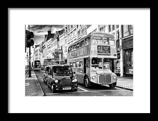 London Traffic Framed Print featuring the photograph London Traffic Scene by John Rizzuto