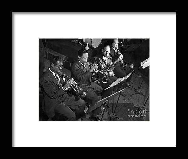 Clarinet Framed Print featuring the photograph Louis Armstrong And Jazz Combo Playing by Bettmann