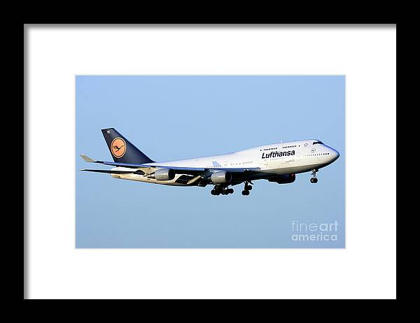 Lufthansa Framed Print featuring the photograph Lufthansa commercial flight e7 by Nir Ben-Yosef