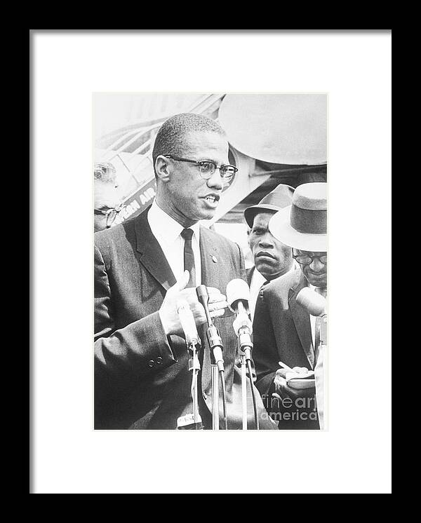 People Framed Print featuring the photograph Malcolm X Speaking To The Press by Bettmann