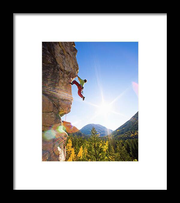 Aspen Framed Print featuring the photograph Man Rock Climbing, Dangling From by Tyler Stableford