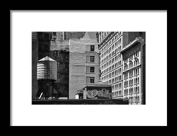 Water Tank Framed Print featuring the photograph Manhattan Rooftops - No.3 by Steve Ember