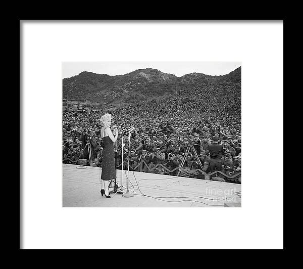 Singer Framed Print featuring the photograph Marilyn Monroe Sings For Troops by Bettmann