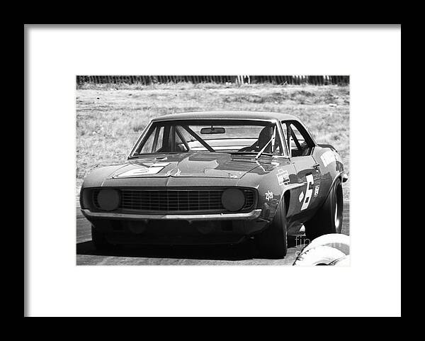 Mark Donohue Framed Print featuring the photograph Mark Donohue turn 9 by Dave Allen