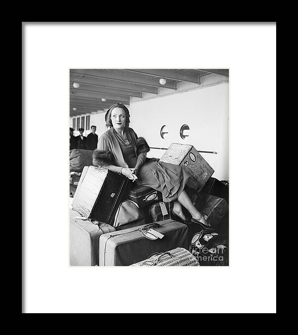 People Framed Print featuring the photograph Marlene Dietrich On Boat, On Luggage by Bettmann