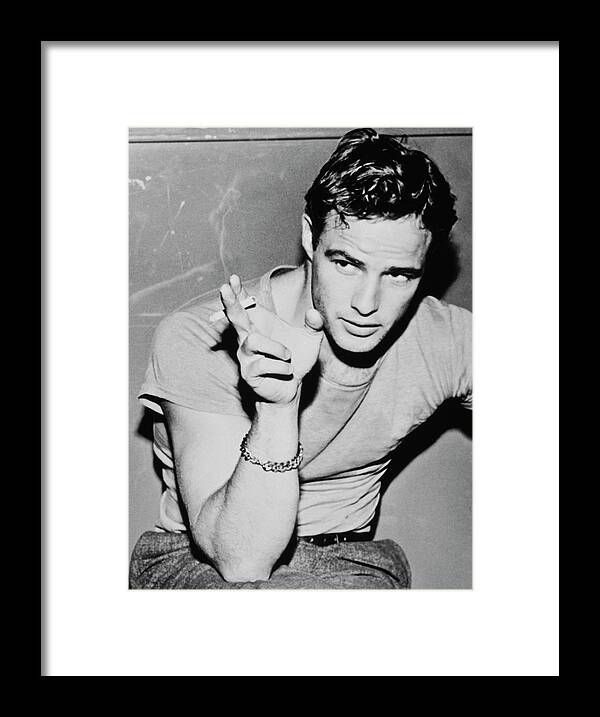 Smoking Framed Print featuring the photograph Marlon Brando by Archive Photos