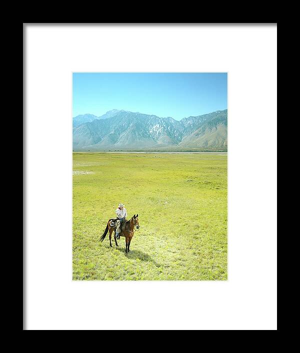 One Man Only Framed Print featuring the photograph Mature Cowboy On Arabian Horse Using by Stephen Swintek