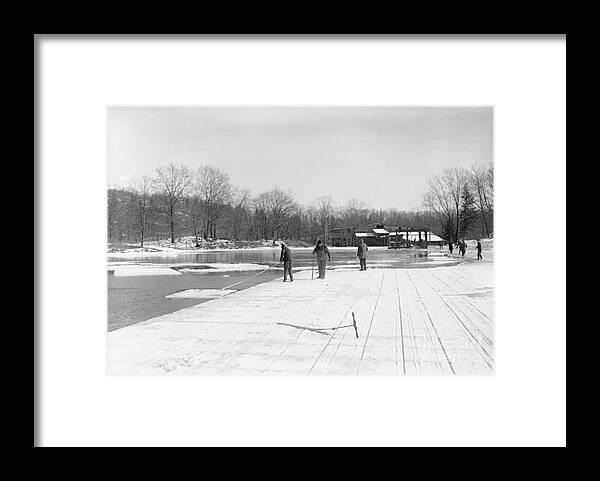 People Framed Print featuring the photograph Men Gathering Ice From Frozen Pond by Bettmann