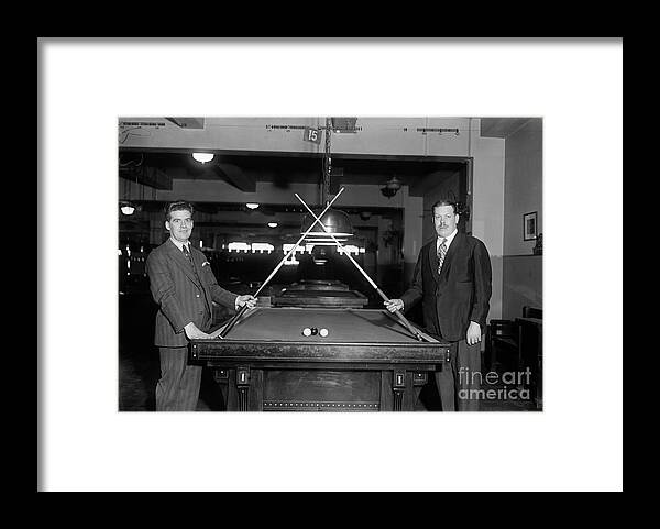 People Framed Print featuring the photograph Men With Pool Stick Crossed, I.e. A Duel by Bettmann