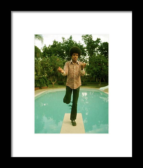 Michael Jackson Framed Print featuring the photograph Michael Jackson On The Diving Board by Michael Ochs Archives