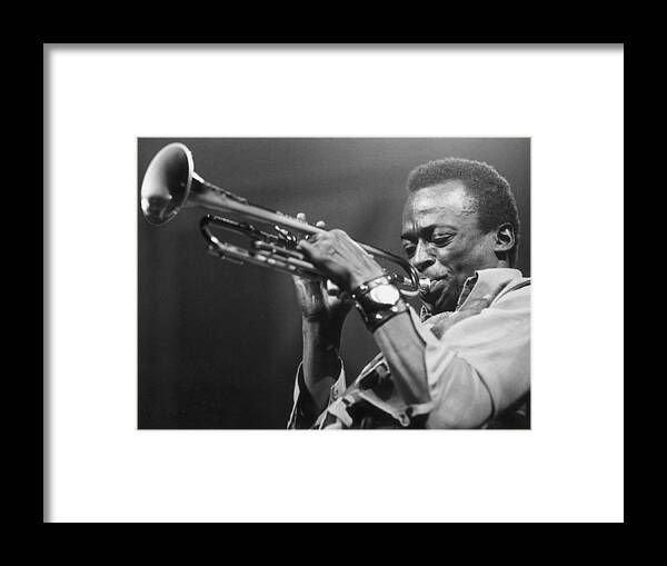 Miles Davis Framed Print featuring the photograph Miles Davis by Express Newspapers