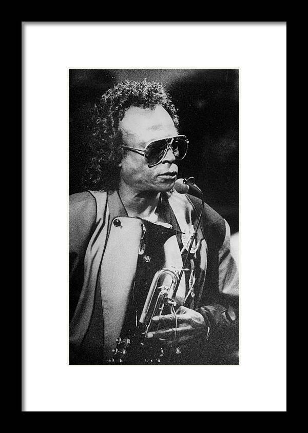 Miles Davis Framed Print featuring the photograph Miles Davis Performing In A Club by New York Daily News Archive