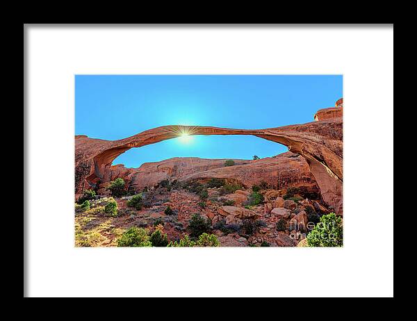 Moab Landscape Arch Framed Print featuring the photograph Moab Landscape Arch Sun Star by Aloha Art