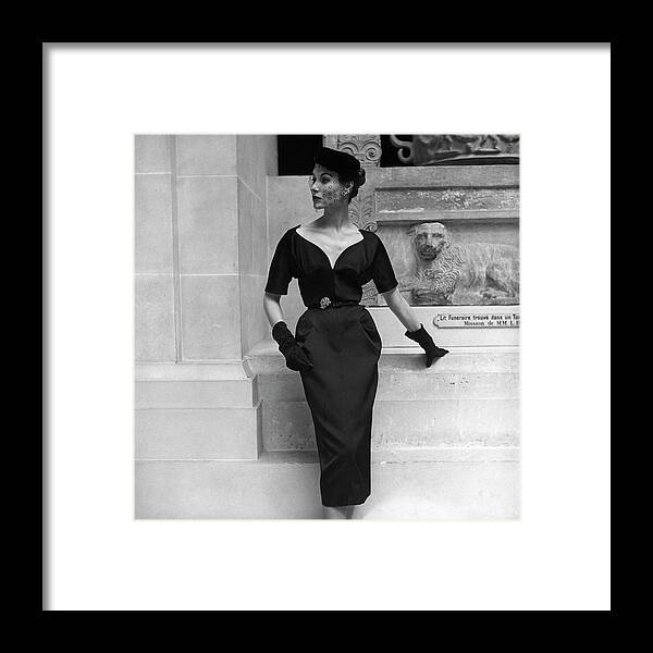 #new2022vogue Framed Print featuring the photograph Model Beside A Stone Facade With Frieze by Frances McLaughlin-Gill