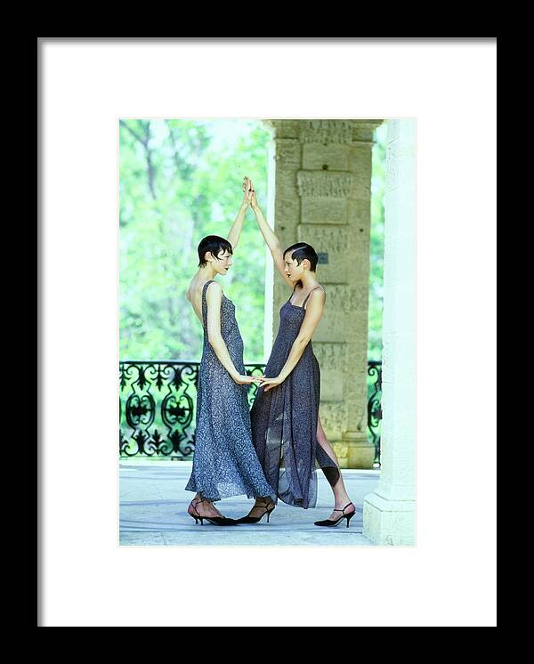 #new2022vogue Framed Print featuring the photograph Models Dancing In Chiffon Dresses by Arthur Elgort