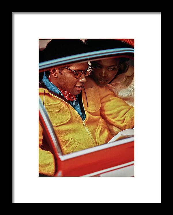 #new2022 Framed Print featuring the photograph Models Sitting In A Red Car by Jacques Malignon