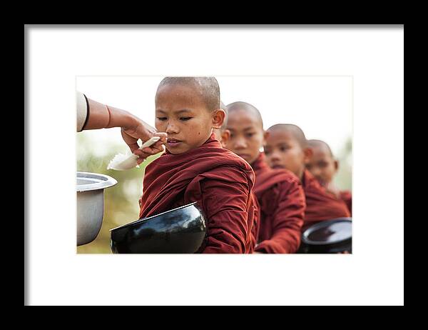 Child Framed Print featuring the photograph Monks Collecting Alms, Bagan, Myanmar by Peter Adams