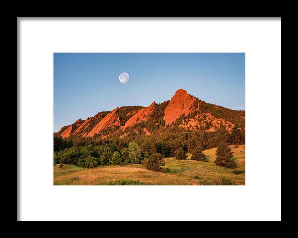 Boulder Framed Print featuring the photograph Moonset over the Flatirons by Darren White