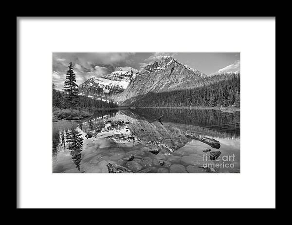 Cavell Framed Print featuring the photograph Morning Reflections In Cavell Pond Black And White by Adam Jewell