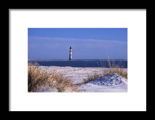 Water's Edge Framed Print featuring the photograph Morris Island Lighthouse At Folley Beach by Photorx