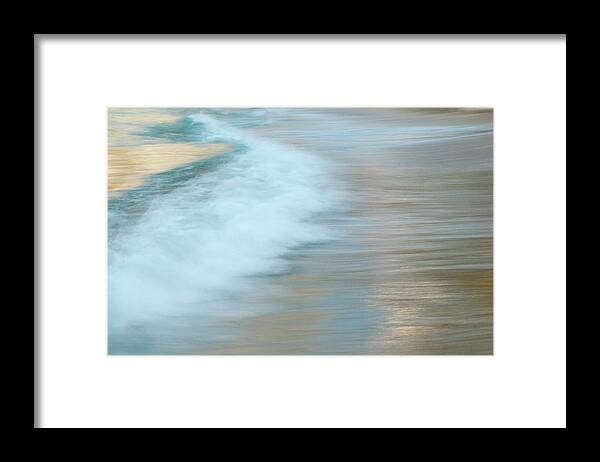 Tranquility Framed Print featuring the photograph Motion Of Surf On The Beach by Stuart Mccall
