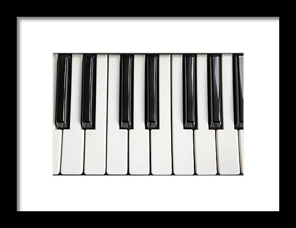 Black Color Framed Print featuring the photograph Musical Keyboard by Richard Newstead