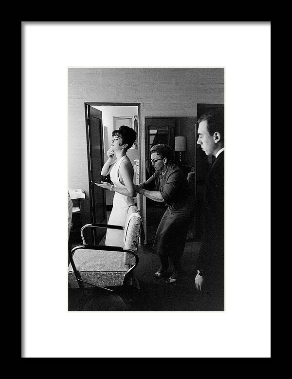 Vertical Framed Print featuring the photograph Natalie Wood Getting Dressed by Allan Grant