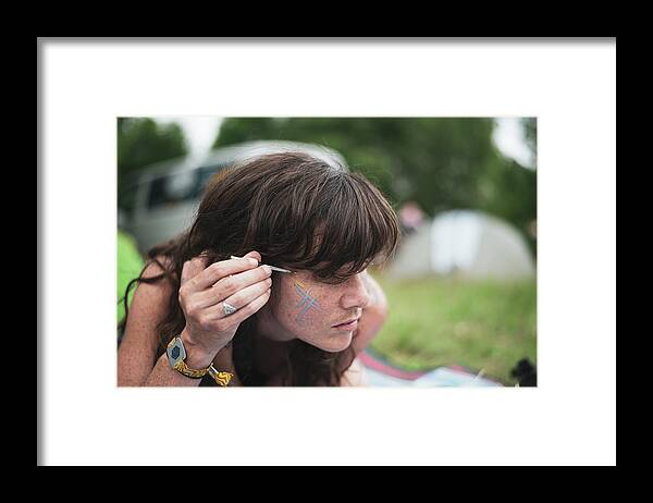 Portrait Framed Print featuring the photograph Natural Woman With Freckles Paints Face At Camp Picnic Festival by Cavan Images