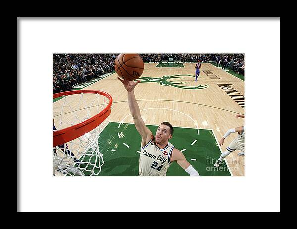 Pat Connaughton Framed Print featuring the photograph New York Knicks V Milwaukee Bucks by Gary Dineen
