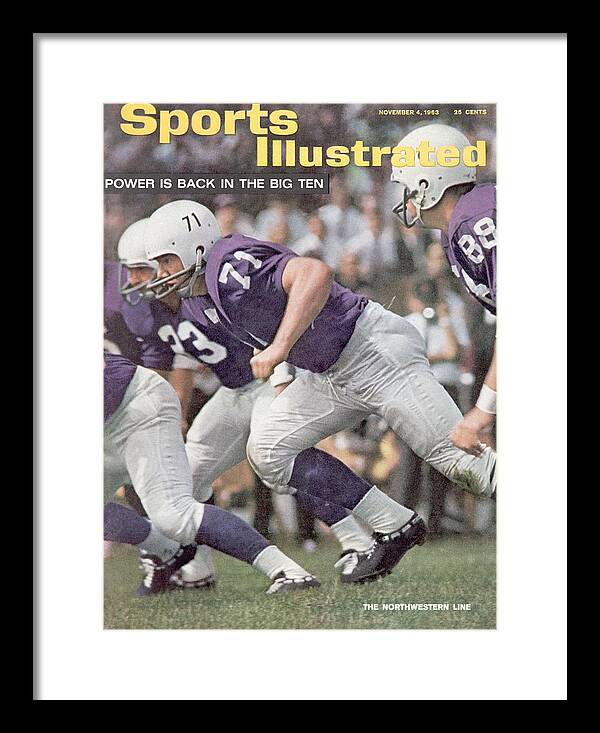 Magazine Cover Framed Print featuring the photograph Northwestern University Linemen Sports Illustrated Cover by Sports Illustrated