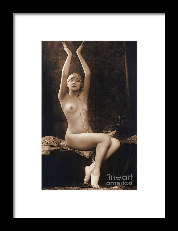 Child Framed Print featuring the photograph Nude Model Striking Pose by Bettmann