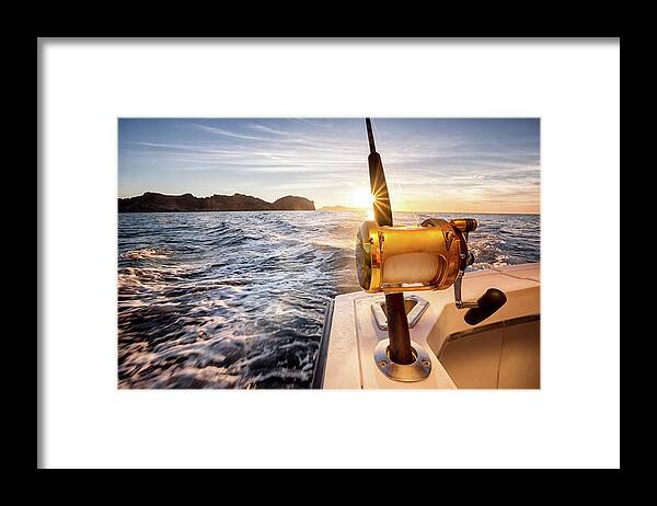 Ocean Fishing Reel On A Boat In The Framed Print by Grandriver 