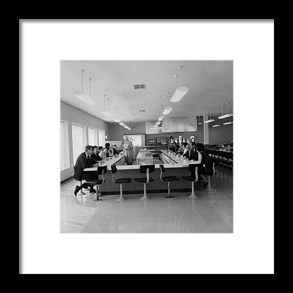 England Framed Print featuring the photograph Office Cafeteria by Evening Standard