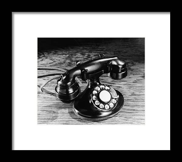 People Framed Print featuring the photograph Old-fashioned Black Rotary Telephone by Frederic Lewis