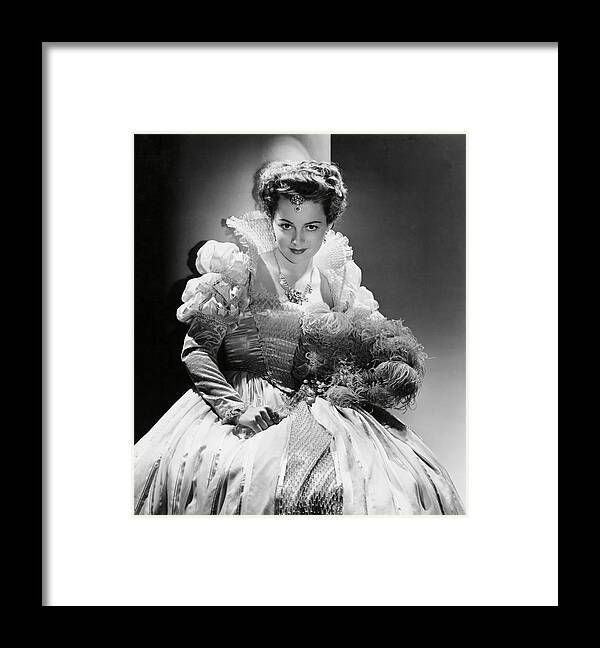 Elisabeth I Of England Framed Print featuring the photograph OLIVIA DE HAVILLAND in THE PRIVATE LIVES OF ELISABETH AND ESSEX -1939-. by Album