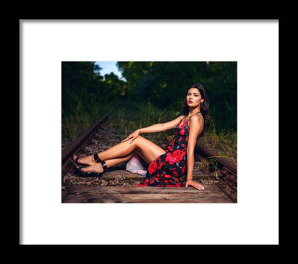 Portrait Framed Print featuring the photograph On The Rails by Vasil Nanev