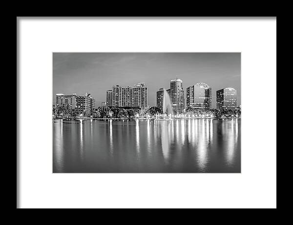 America Framed Print featuring the photograph Orlando Skyline and Lake Eola Fountain at Dusk - Monochrome by Gregory Ballos