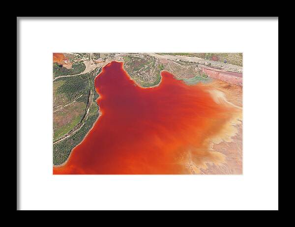 Melting Framed Print featuring the photograph Oxidized Iron Minerals In Water by Peter Adams
