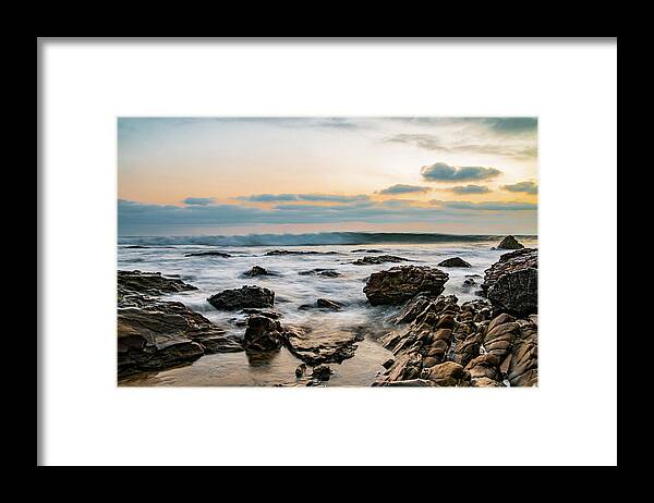 Local Snaps Photography Framed Print featuring the photograph Painted waves on rocky beach sunset by Local Snaps Photography