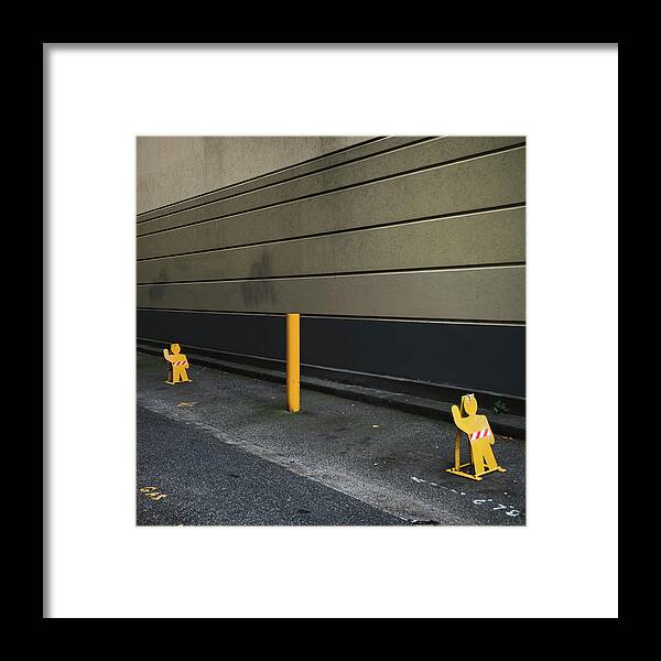 Tranquility Framed Print featuring the photograph Parking Guards Humanoid by John Abbate
