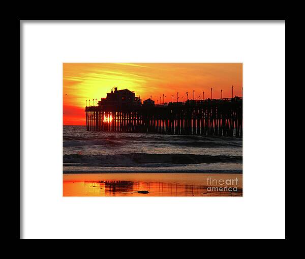 Pacific Ocean Framed Print featuring the photograph Pier at Sunset by Terri Brewster