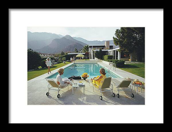 Swimming Pool Framed Print featuring the photograph Poolside Gossip by Slim Aarons