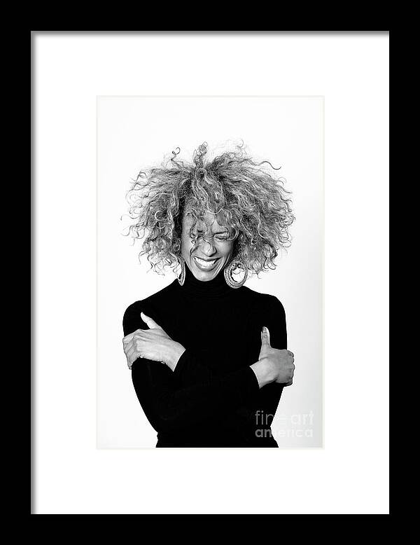 Mature Adult Framed Print featuring the photograph Portrait Of Laughing Woman With Afro by Westend61