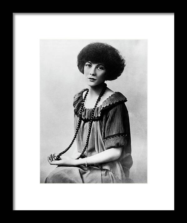 1 Person Framed Print featuring the photograph Portrait Of Young Woman by Underwood Archives