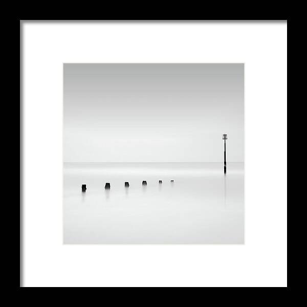 Tranquility Framed Print featuring the photograph Post In Sea by Garykingphotography