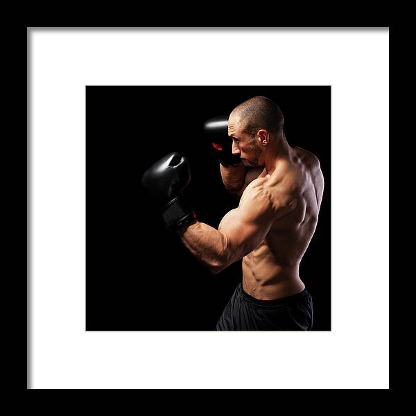 Toughness Framed Print featuring the photograph Powerful Punch by Momcilog